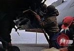 Image of Crew at work on escort carrier of Task Group 52.2  Pacific Ocean, 1945, second 41 stock footage video 65675040328