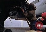 Image of Crew at work on escort carrier of Task Group 52.2  Pacific Ocean, 1945, second 42 stock footage video 65675040328
