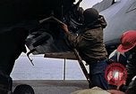 Image of Crew at work on escort carrier of Task Group 52.2  Pacific Ocean, 1945, second 44 stock footage video 65675040328