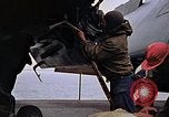 Image of Crew at work on escort carrier of Task Group 52.2  Pacific Ocean, 1945, second 45 stock footage video 65675040328