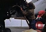 Image of Crew at work on escort carrier of Task Group 52.2  Pacific Ocean, 1945, second 47 stock footage video 65675040328