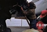 Image of Crew at work on escort carrier of Task Group 52.2  Pacific Ocean, 1945, second 48 stock footage video 65675040328