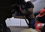 Image of Crew at work on escort carrier of Task Group 52.2  Pacific Ocean, 1945, second 49 stock footage video 65675040328