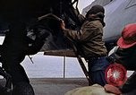 Image of Crew at work on escort carrier of Task Group 52.2  Pacific Ocean, 1945, second 51 stock footage video 65675040328