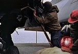Image of Crew at work on escort carrier of Task Group 52.2  Pacific Ocean, 1945, second 53 stock footage video 65675040328