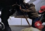 Image of Crew at work on escort carrier of Task Group 52.2  Pacific Ocean, 1945, second 54 stock footage video 65675040328
