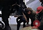 Image of Crew at work on escort carrier of Task Group 52.2  Pacific Ocean, 1945, second 57 stock footage video 65675040328