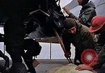 Image of Crew at work on escort carrier of Task Group 52.2  Pacific Ocean, 1945, second 58 stock footage video 65675040328