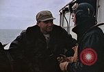 Image of Crews pushing FM-2 wildcat airplanes on escort carrier deck Iwo Jima, 1945, second 3 stock footage video 65675040329