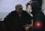 Image of Crews pushing FM-2 wildcat airplanes on escort carrier deck Iwo Jima, 1945, second 7 stock footage video 65675040329