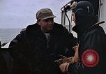 Image of Crews pushing FM-2 wildcat airplanes on escort carrier deck Iwo Jima, 1945, second 8 stock footage video 65675040329