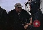 Image of Crews pushing FM-2 wildcat airplanes on escort carrier deck Iwo Jima, 1945, second 10 stock footage video 65675040329