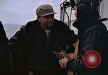 Image of Crews pushing FM-2 wildcat airplanes on escort carrier deck Iwo Jima, 1945, second 14 stock footage video 65675040329