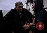 Image of Crews pushing FM-2 wildcat airplanes on escort carrier deck Iwo Jima, 1945, second 17 stock footage video 65675040329