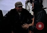 Image of Crews pushing FM-2 wildcat airplanes on escort carrier deck Iwo Jima, 1945, second 19 stock footage video 65675040329