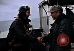 Image of Crews pushing FM-2 wildcat airplanes on escort carrier deck Iwo Jima, 1945, second 23 stock footage video 65675040329