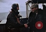 Image of Crews pushing FM-2 wildcat airplanes on escort carrier deck Iwo Jima, 1945, second 26 stock footage video 65675040329