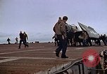 Image of Crews pushing FM-2 wildcat airplanes on escort carrier deck Iwo Jima, 1945, second 34 stock footage video 65675040329