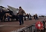 Image of Crews pushing FM-2 wildcat airplanes on escort carrier deck Iwo Jima, 1945, second 43 stock footage video 65675040329