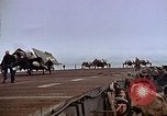 Image of Crews pushing FM-2 wildcat airplanes on escort carrier deck Iwo Jima, 1945, second 51 stock footage video 65675040329