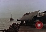 Image of Mail and personnel transfer between escort carrier and destroyer escor Pacific Ocean, 1945, second 3 stock footage video 65675040330