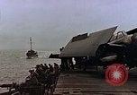 Image of Mail and personnel transfer between escort carrier and destroyer escor Pacific Ocean, 1945, second 9 stock footage video 65675040330