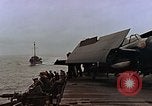 Image of Mail and personnel transfer between escort carrier and destroyer escor Pacific Ocean, 1945, second 10 stock footage video 65675040330