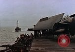 Image of Mail and personnel transfer between escort carrier and destroyer escor Pacific Ocean, 1945, second 12 stock footage video 65675040330