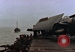 Image of Mail and personnel transfer between escort carrier and destroyer escor Pacific Ocean, 1945, second 13 stock footage video 65675040330