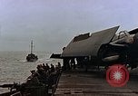 Image of Mail and personnel transfer between escort carrier and destroyer escor Pacific Ocean, 1945, second 15 stock footage video 65675040330
