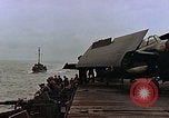 Image of Mail and personnel transfer between escort carrier and destroyer escor Pacific Ocean, 1945, second 17 stock footage video 65675040330