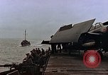Image of Mail and personnel transfer between escort carrier and destroyer escor Pacific Ocean, 1945, second 18 stock footage video 65675040330