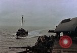 Image of Mail and personnel transfer between escort carrier and destroyer escor Pacific Ocean, 1945, second 24 stock footage video 65675040330