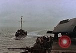 Image of Mail and personnel transfer between escort carrier and destroyer escor Pacific Ocean, 1945, second 25 stock footage video 65675040330