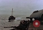 Image of Mail and personnel transfer between escort carrier and destroyer escor Pacific Ocean, 1945, second 27 stock footage video 65675040330