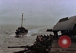 Image of Mail and personnel transfer between escort carrier and destroyer escor Pacific Ocean, 1945, second 28 stock footage video 65675040330