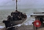 Image of Mail and personnel transfer between escort carrier and destroyer escor Pacific Ocean, 1945, second 29 stock footage video 65675040330
