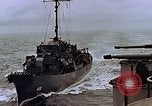 Image of Mail and personnel transfer between escort carrier and destroyer escor Pacific Ocean, 1945, second 30 stock footage video 65675040330