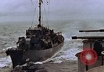 Image of Mail and personnel transfer between escort carrier and destroyer escor Pacific Ocean, 1945, second 31 stock footage video 65675040330
