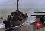 Image of Mail and personnel transfer between escort carrier and destroyer escor Pacific Ocean, 1945, second 33 stock footage video 65675040330