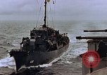 Image of Mail and personnel transfer between escort carrier and destroyer escor Pacific Ocean, 1945, second 34 stock footage video 65675040330
