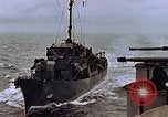 Image of Mail and personnel transfer between escort carrier and destroyer escor Pacific Ocean, 1945, second 35 stock footage video 65675040330