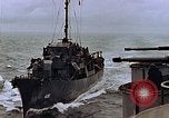 Image of Mail and personnel transfer between escort carrier and destroyer escor Pacific Ocean, 1945, second 37 stock footage video 65675040330