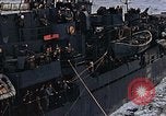Image of Mail and personnel transfer between escort carrier and destroyer escor Pacific Ocean, 1945, second 39 stock footage video 65675040330