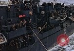 Image of Mail and personnel transfer between escort carrier and destroyer escor Pacific Ocean, 1945, second 40 stock footage video 65675040330