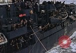 Image of Mail and personnel transfer between escort carrier and destroyer escor Pacific Ocean, 1945, second 41 stock footage video 65675040330
