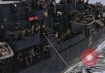 Image of Mail and personnel transfer between escort carrier and destroyer escor Pacific Ocean, 1945, second 43 stock footage video 65675040330