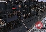 Image of Mail and personnel transfer between escort carrier and destroyer escor Pacific Ocean, 1945, second 44 stock footage video 65675040330
