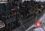 Image of Mail and personnel transfer between escort carrier and destroyer escor Pacific Ocean, 1945, second 46 stock footage video 65675040330