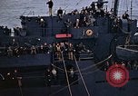 Image of Mail and personnel transfer between escort carrier and destroyer escor Pacific Ocean, 1945, second 49 stock footage video 65675040330